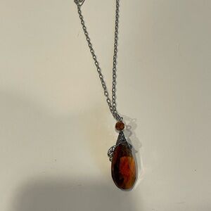 Elegant Silver and Amber Pendant Necklace